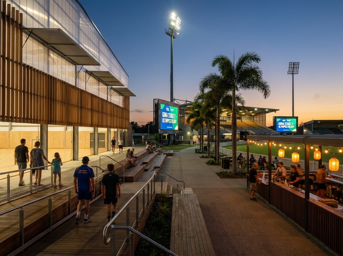 AI-generated interior of a multi-sport indoor arena with accessible seating, broadcast lighting, and flexible courts for basketball and netball